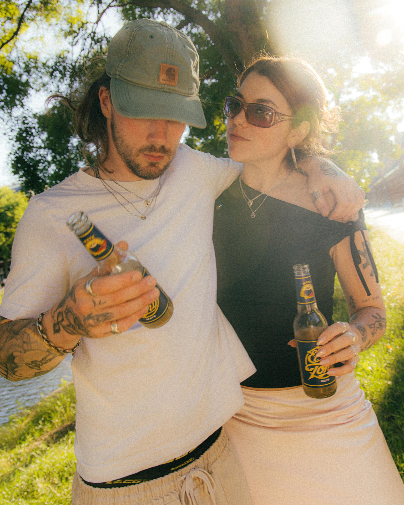 KAT & MAROKI enjoying drinks outdoors
